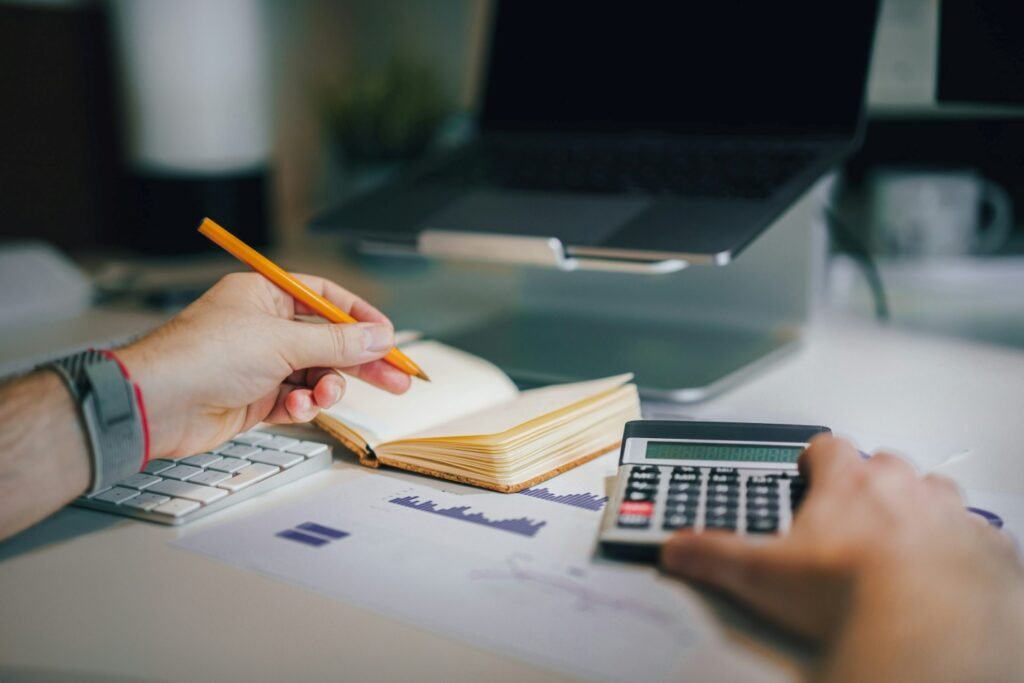 A person using a calculator